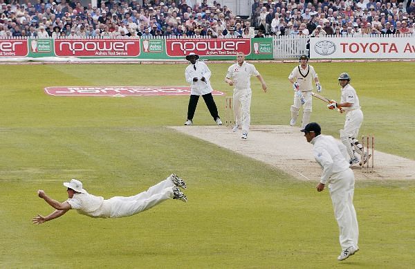 Adam Gilchrist looks back in shock as Strauss pulls of a stunner at slip.